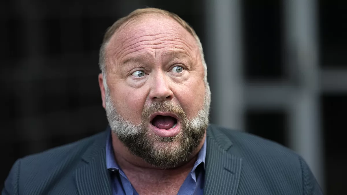 Alex Jones wants to halt the transaction as the Onion’s bid to purchase Infowars goes before the judge.